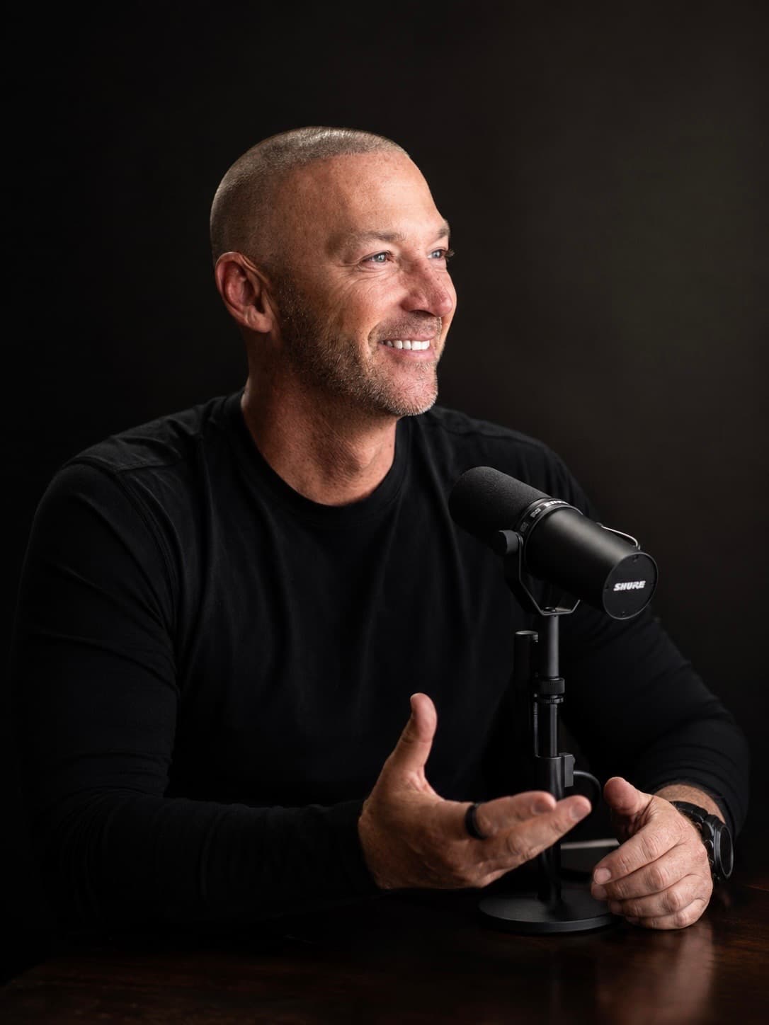 David P. Cook at the microphone